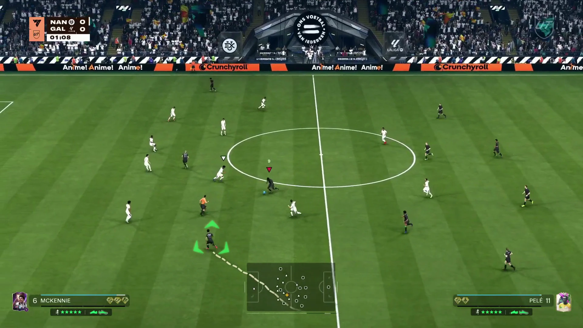 In possession, green chevrons on the open teammate with his run traced behind him.